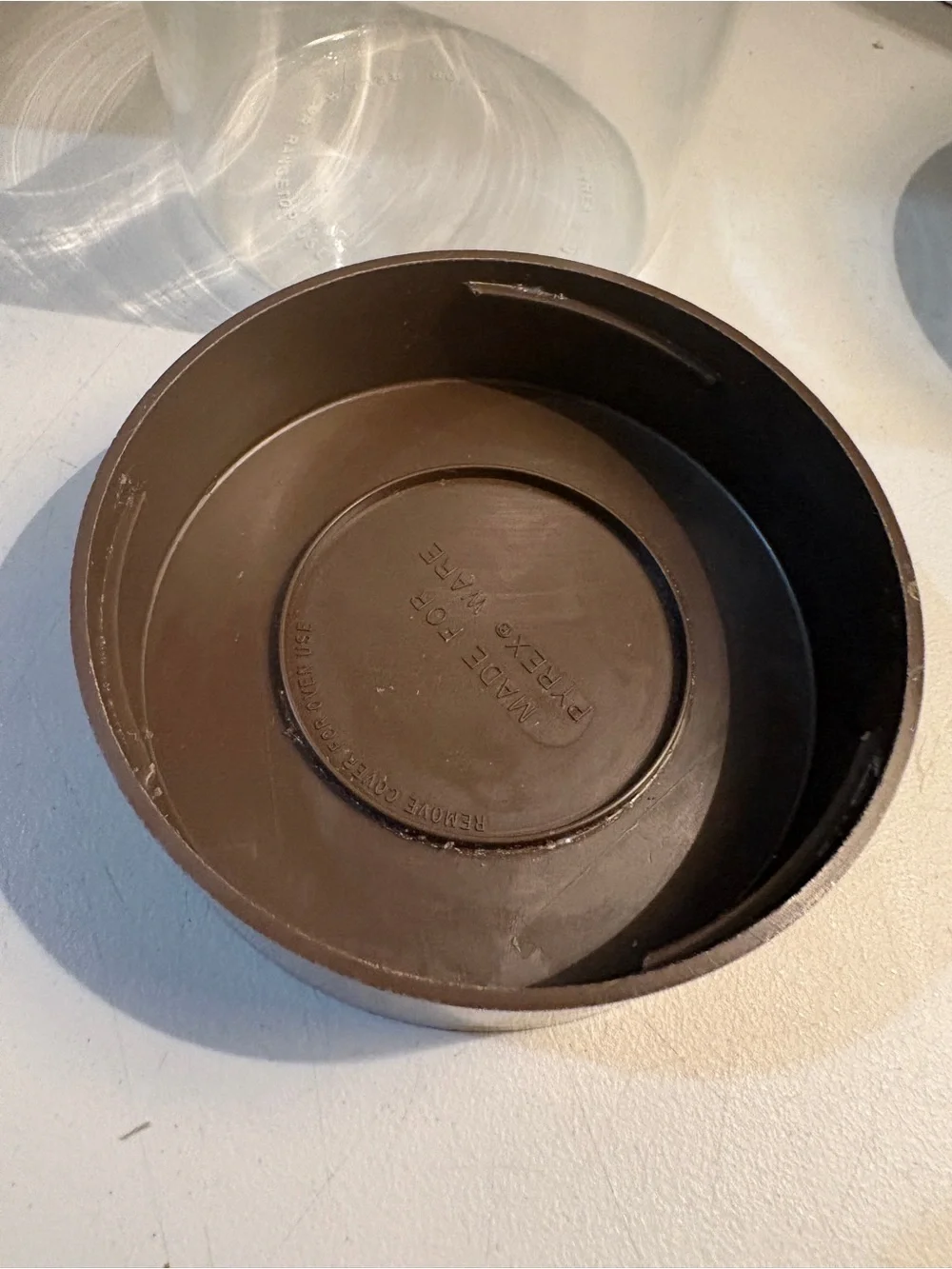 Vintage 1970s Pyrex canister with wood grain lid 7”